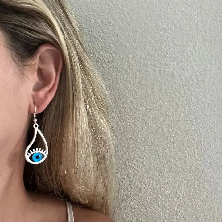 Round  silver earrings with leather